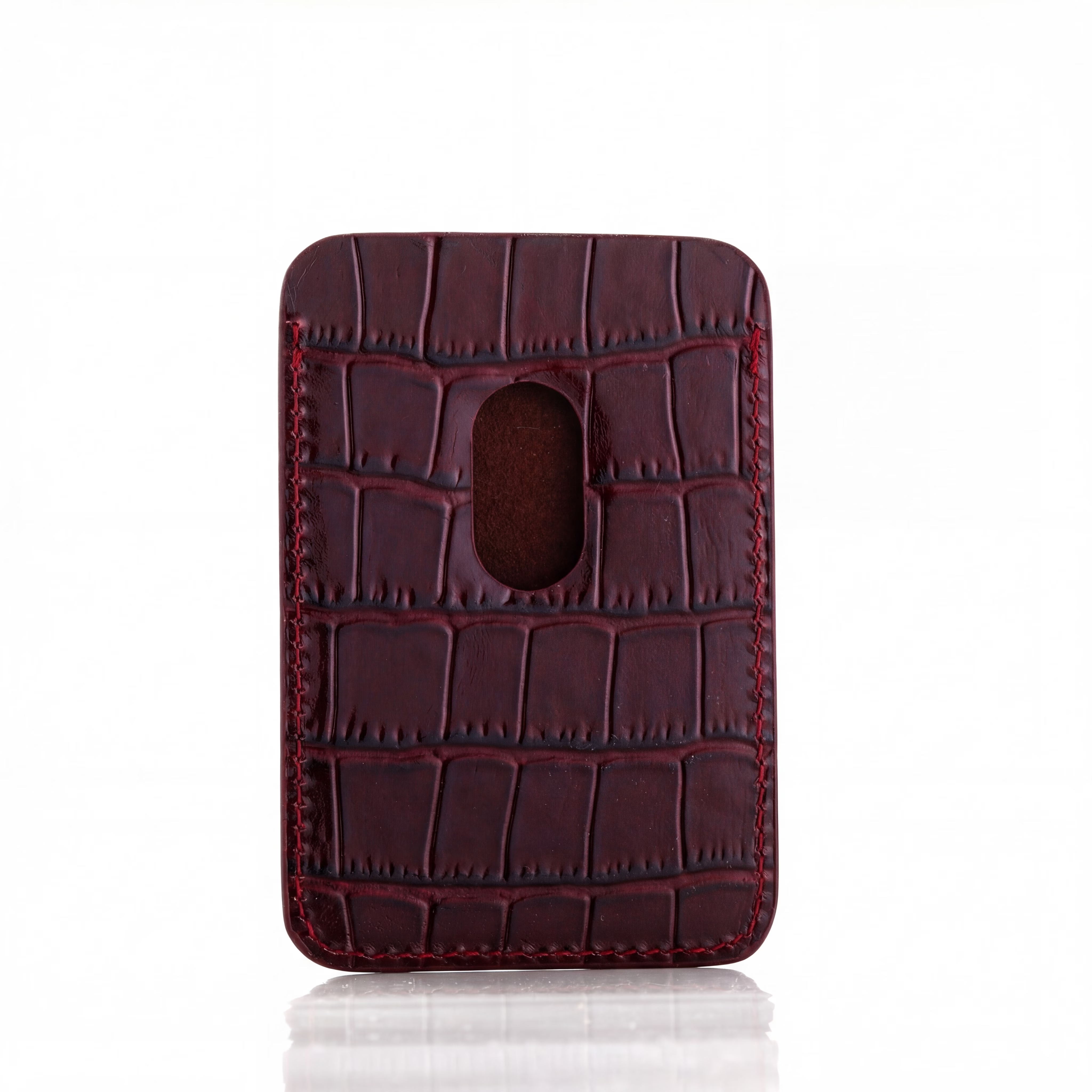 Back side of Burgundy crocodile-patterned MagSafe cardholder on a white background by GENTCREATE